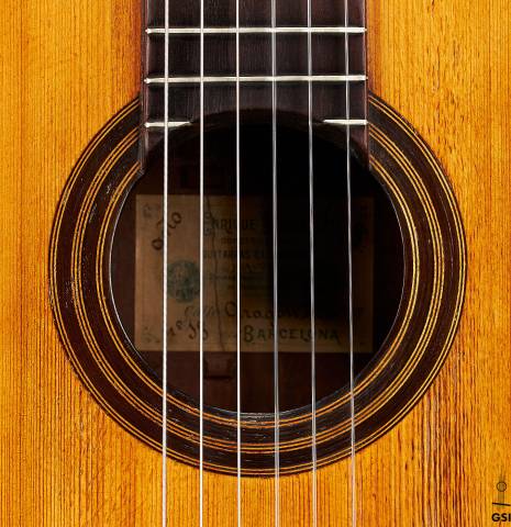 The rosette of a 1903 Enrique Garcia classical guitar made of spruce and mahogany
