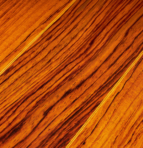 The back center wedge of a 1993 Abel Garcia classical guitar made of spruce and CSA rosewood
