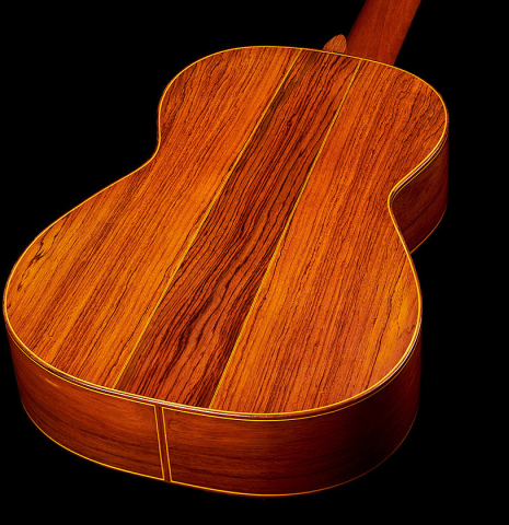 The back and sides at the foot of a 1993 Abel Garcia classical guitar made of spruce and CSA rosewood