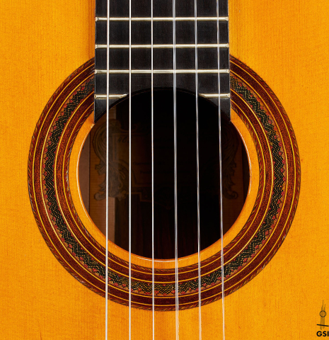 The rosette of a 1993 Abel Garcia classical guitar made of spruce and CSA rosewood