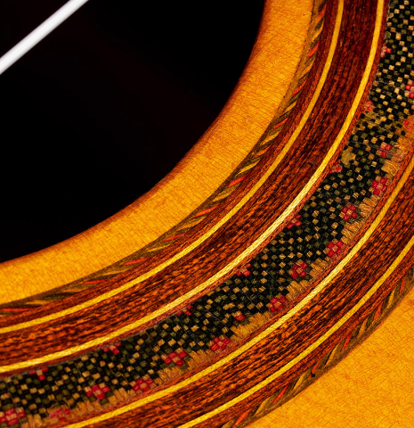 Close-up detail of the rosette of a 1993 Abel Garcia classical guitar made of spruce and CSA rosewood