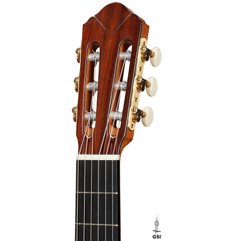 The headstock of a 2024 Dario Garcia classical guitar made of cedar and African rosewood