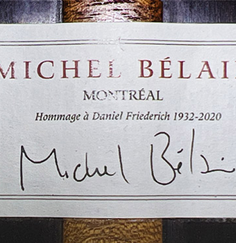 The label of a 2022 Michel Belair &quot;Hommage a Daniel Friederich&quot; classical guitar made of cedar and Indian rosewood