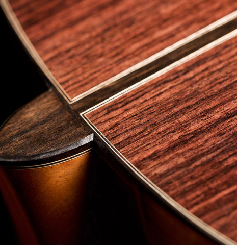 The back and heel of a 2022 Michel Belair &quot;Hommage a Daniel Friederich&quot; classical guitar made of cedar and Indian rosewood