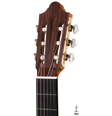 The headstock of a 2022 Michel Belair &quot;Hommage a Daniel Friederich&quot; classical guitar made of cedar and Indian rosewood