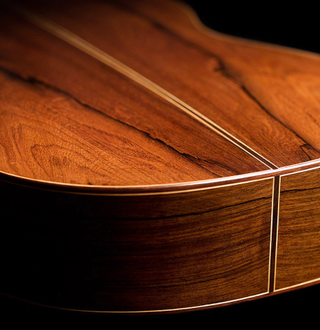 The back and sides of a 2021 Pavel Gavryushov classical guitar made of cedar and African rosewood