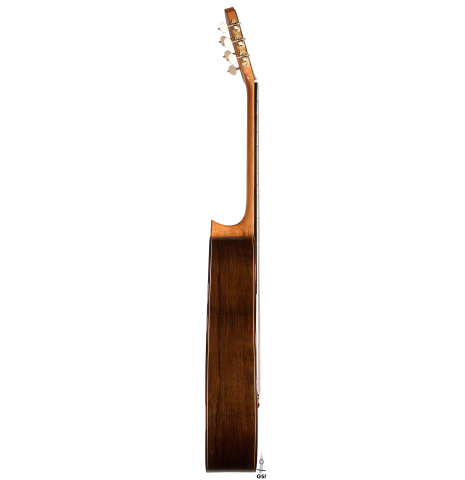 The side of a 2021 Pavel Gavryushov classical guitar made of cedar and African rosewood