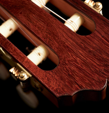 The headstock and tuning machines of a 2023 Pavel Gavryushov classical guitar made of spruce and African rosewood