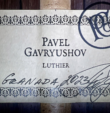The label of a 2023 Pavel Gavryushov classical guitar made of spruce and African rosewood