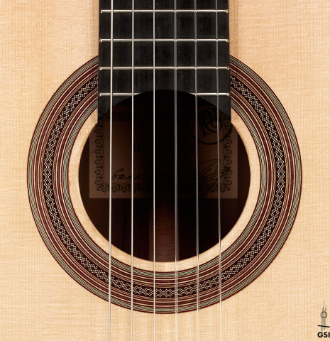 The rosette of a 2023 Pavel Gavryushov classical guitar made of spruce and African rosewood