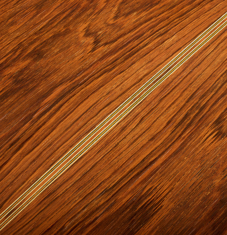 The back center seam of a 1972 Giannini AW-80 classical guitar made of spruce and CSA rosewood
