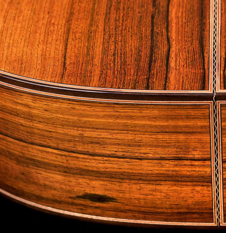 The back and sides of a 2017 Ennio Giovanetti classical guitar made with spruce top and CSA rosewood