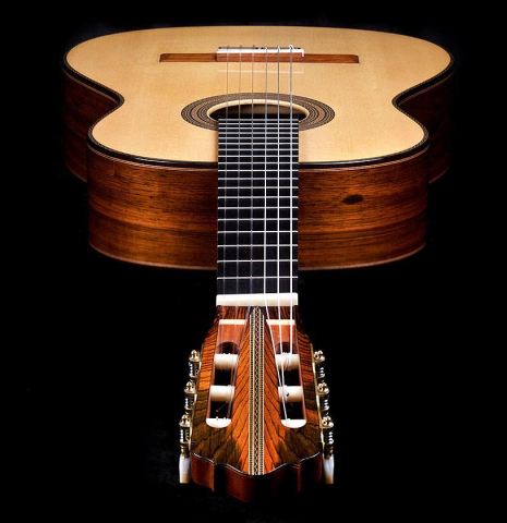 The front and headstock of a 2017 Ennio Giovanetti classical guitar made with spruce top and CSA rosewood back and sides