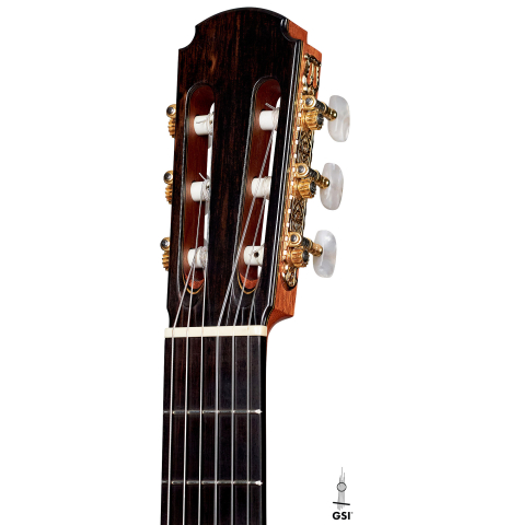 This is the headstock of a 1994 Gioachino Giussani SP/CSAR classical guitar, ex Angel Romero on a white background