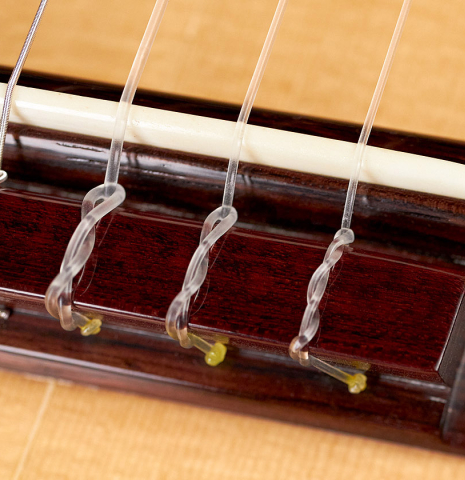 This is the bridge, tie-block and saddle of a 1994 Gioachino Giussani SP/CSAR classical guitar, ex Angel Romero