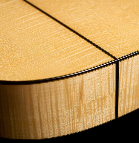 This is a close-up of the maple back and sides at the foot of a 1994 Gioachino Giussani SP/MP classical guitar, ex Angel Romero