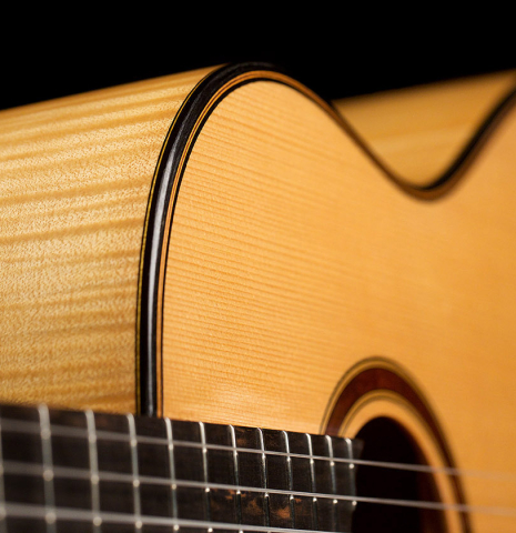 This is a close-up of the maple side and spruce top of a 1994 Gioachino Giussani SP/MP classical guitar, ex Angel Romero