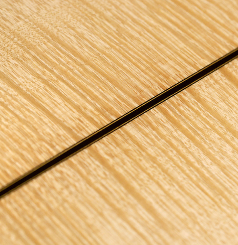 This is a close-up of the maple back of a 1994 Gioachino Giussani SP/MP classical guitar, ex Angel Romero