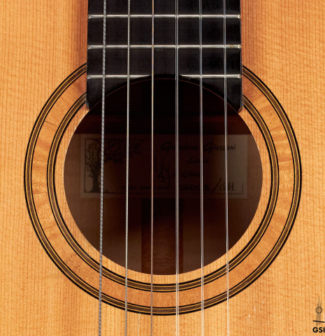 The rosette of a 1991 Gioachino Giussani classical guitar made of spruce and maple.