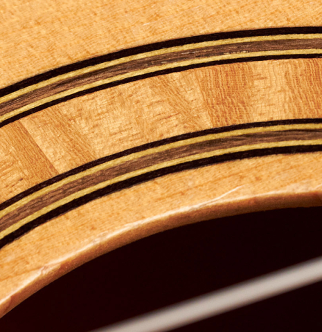 The rosette of a 1991 Gioachino Giussani classical guitar made of spruce and maple.