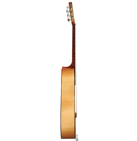The side of a 1991 Gioachino Giussani classical guitar made of spruce and maple.