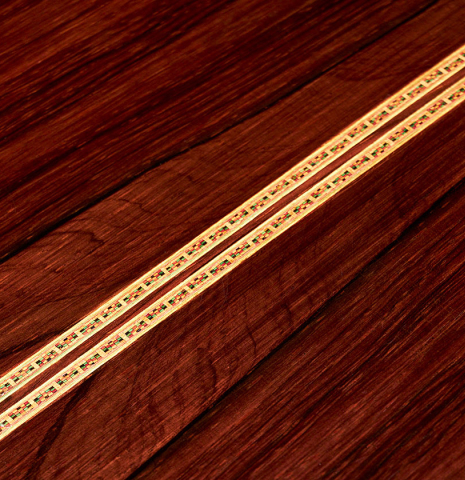 The back of a 1947 Diego y Gracia classical guitar made of spruce and CSA rosewood