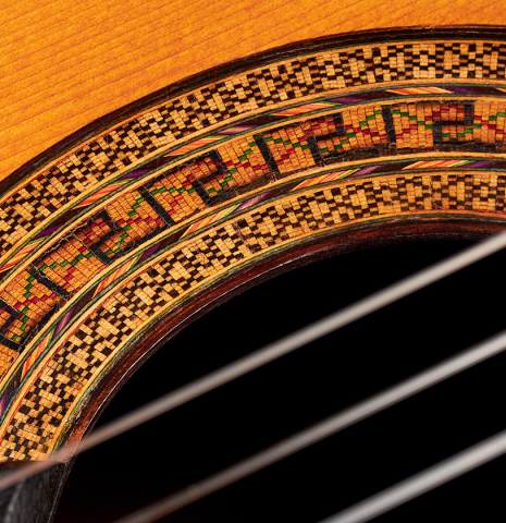 A close-up of the rosette of a 1947 Diego y Gracia classical guitar made of spruce and CSA rosewood