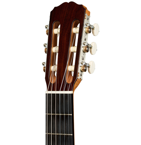 The headstock of a 2025 Mario Grimaldi "1920 Santos" classical guitar made of spruce and African rosewood