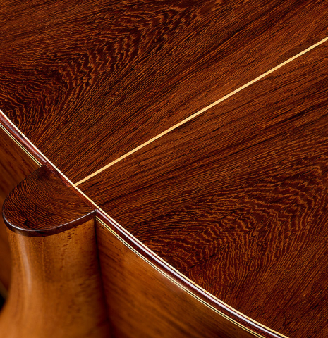 The heel, back binding and purfling of a 2026 Mario Grimaldi "1920 Santos" classical guitar made of spruce and African rosewood