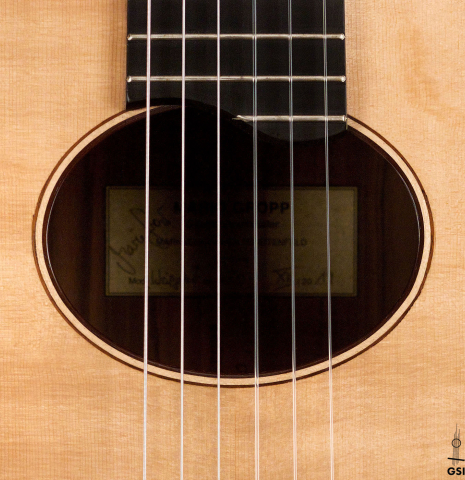 The oval rosette of a 2019 Mario Gropp "Weissgerber" made of spruce and exotic ebony