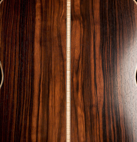 The soundboard and oval rosette of a 2019 Mario Gropp "Weissgerber" made of spruce and exotic ebony