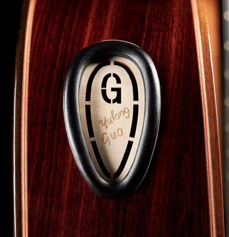 The soundport of a 2021 Yulong Guo &quot;Chamber Concert&quot; classical guitar made with spruce top and Indian rosewood back and sides.