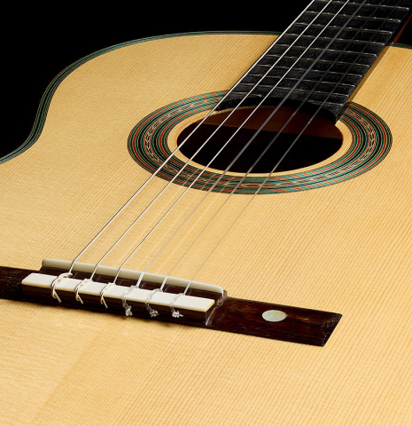 The soundboard of a 2025 Yulong Guo "Torres SE 124" classical guitar made of spruce and cypress