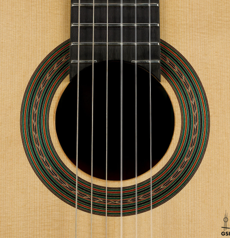 The rosette of a 2025 Yulong Guo "Torres SE 124" classical guitar made of spruce and cypress