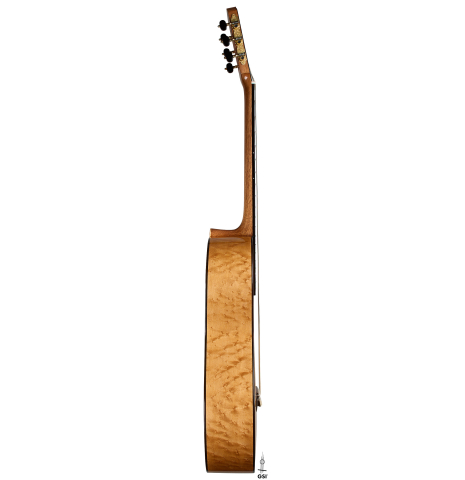 The side of a 2025 Yulong Guo "Torres SE 124" classical guitar made of spruce and maple
