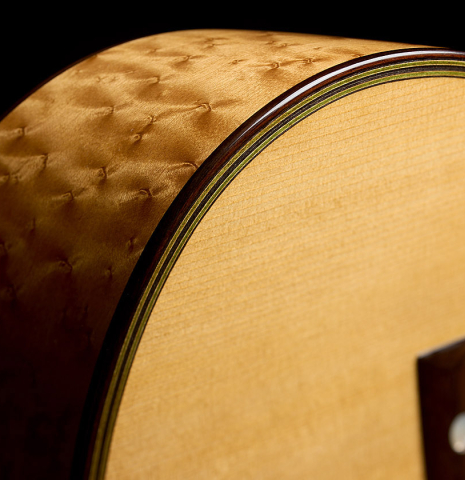 The back and sides of a 2025 Yulong Guo "Torres SE 124" classical guitar made of spruce and maple