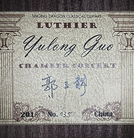 The label of a 2018 Yulong Guo "Chamber Concert" classical guitar made of spruce and Indian rosewood