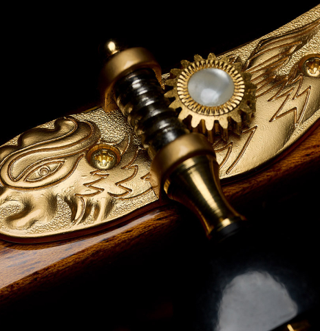 The tuning machine plate of a 2018 Yulong Guo "Chamber Concert" classical guitar made of spruce and Indian rosewood