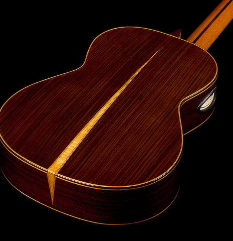 The back and sides of a 2018 Yulong Guo "Chamber Concert" classical guitar made of spruce and Indian rosewood