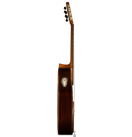 The side of a 2018 Yulong Guo "Chamber Concert" classical guitar made of spruce and Indian rosewood