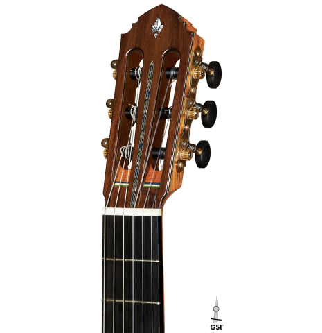 The headstock of a 2023 Miguel Angel Gutierrez classical guitar made of spruce and Indian rosewood.