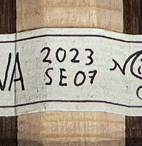 The label of a 2023 Miguel Angel Gutierrez classical guitar made of spruce and Indian rosewood.