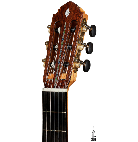 The headstock of a 2024 Miguel Angel Gutierrez classical guitar made of spruce and Indian rosewood.