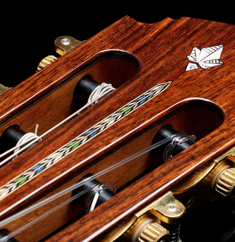 The headstock with inlay of a 2024 Miguel Angel Gutierrez classical guitar made of spruce and Indian rosewood.