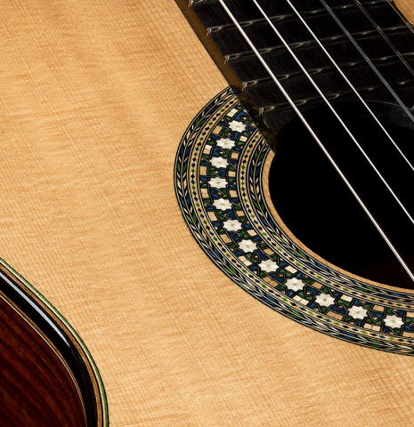 The soundboard and rosette detail of a 2026 Miguel Angel Gutiérrez classical guitar made of spruce and Indian rosewood