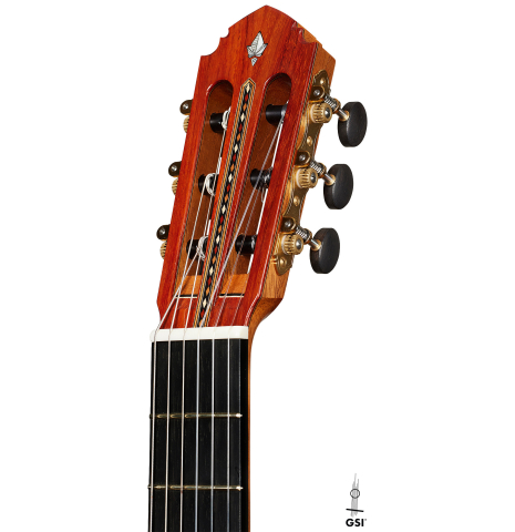 The headstock of a 2025 Miguel Angel Gutierrez "REG 2025" classical guitar made of cedar and padauk