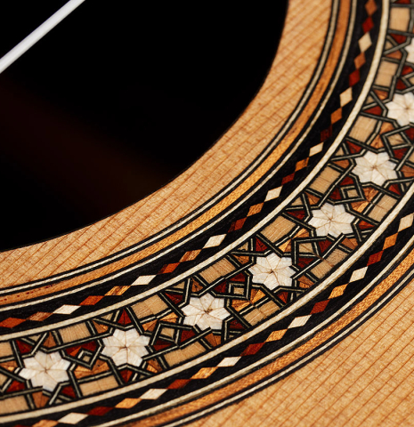 Close-up detail of the rosette of a 2025 Miguel Angel Gutierrez "REG 2025" classical guitar made of cedar and padauk