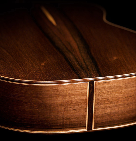 The back and sides of a 2021 Henner Hagenlocher classical guitar made with cedar and CSA rosewood