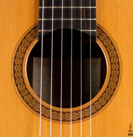 The rosette of a 2008 Henner Hagenlocher classical guitar made of cedar and CSA rosewood