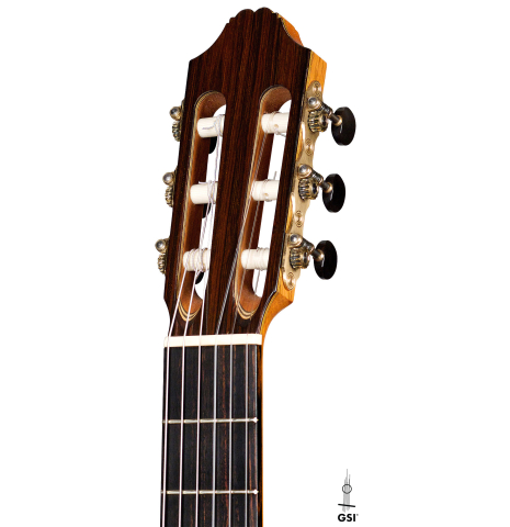 The headstock and machine heads of a 2008 Henner Hagenlocher classical guitar made of cedar and CSA rosewood
